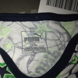 Three different Puma onesies